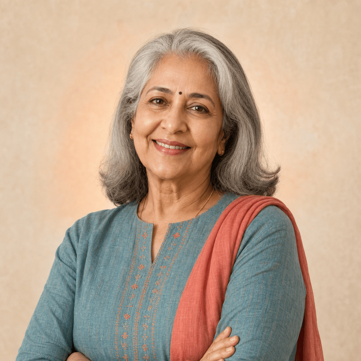 A confident senior Indian woman smiling warmly
